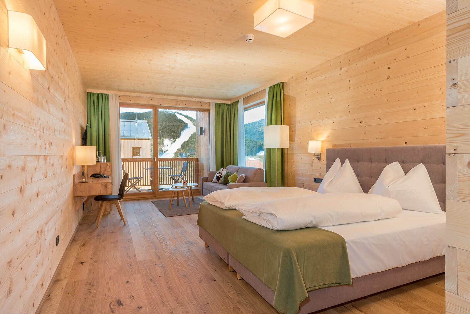 Bright double room with wooden walls